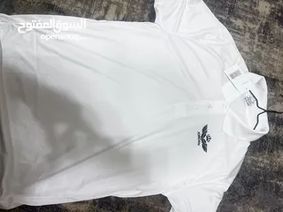  7 500 بلوزه بولو نوع ممتاز وألوان متعدده بشعارات المملكه