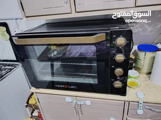  1 فرن كهربائي من نوع هوم اليكترك مستعمل يعمل بحالة ممتازة لكن يوجد مشكلة بسيطة في الباب