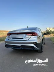  23 كيا K3 2022 فل اعلى صنف عدا الفتحة وارد كوري جمرك جديد فحص كامل كاش او اقساط باقل سعر في السوق