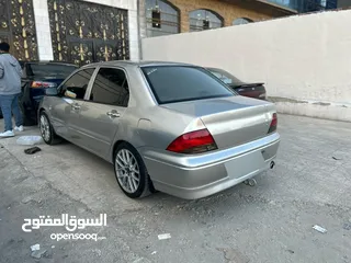  8 ميتسوبيشي لانسر 2002 بحالة الوكالة
