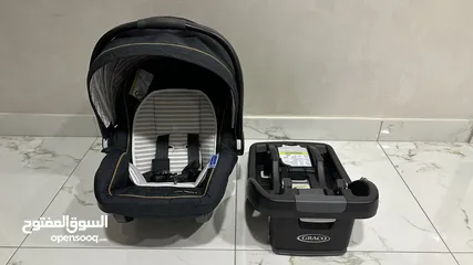  1 Graco snugride 35 car seat with base