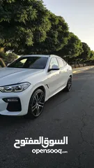  12 BMW X6 X DRIVE 400i 2022بحالة الوكالة