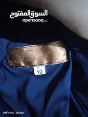  2 فستان سهرة كحلي ودهبي طويل