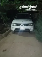  1 بك اب متسوبيشي   l200 موديل 2009 فور ويل 4X4