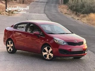  1 كيا ريو 2013  وارد الوكاله ممشى قليل بحالة الشركة  فحص كامل