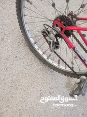  3 بسكليت جنط 26امريكي غيارات ابريكات امريكي عجال الالمنيوم لون احمر اصلي