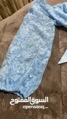  4 ‏فستان سهرة ‏قصير نوعا ما لونه ازرق سماوي ‏