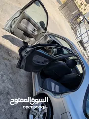  18 كيا سبيكترا 2001 بسعر 2400 جير عادي سياره نظيفه جدا  kia spectra 2001