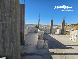  7 قطعة ارض مع بيت للبيع
