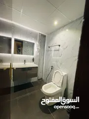  14 For sale in Ajman, in Horizon Towers Ajman, the most elegant and elegant, two rooms and a hall, over