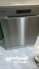  1 جلاي سامسونج شبه جديد مع طاوله سفره
