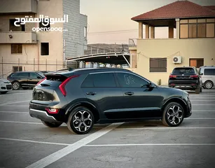  8 كايا نيرو  هايبرد (بنزين+كهرباء ) فل الفل فتحة سقف  /2022 عداد قليل 18000Km