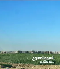  6 ارض للبيع 810متر بعد جسر المطار مقابل محطة المناصير منطقة شاليهات