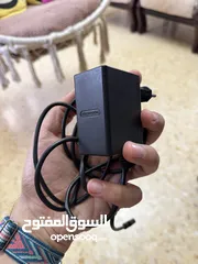  4 مع شريط لعبه Nintendo Switch light