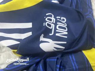  7 قميص نادي النصر السعودي القميص اصلي 100٪من اديداس وليس عليه شئ طباعة استعماله تحت المتوسط لاكنه جديد