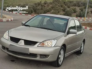  25 متسوبيشي لانسر 2009 وارد كويتي ماتور 1600 اصلي بحاله ممتازه جدا جدا