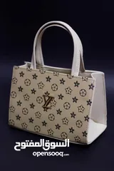  9 ماركت مايكل كورس.LV.شانيل