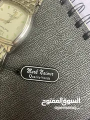  7 ساعة mark naimer يابانية ستانلس ستيل ضد الماء عقارب عادية فضية و بيضاء من الداخل و يوجد تفاصيل خضراء