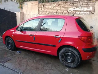  6 بيجو307 موديل2006 رقم بغداد بأسمي محرك1600