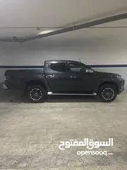  12 ميتسوبيشي سبورتيرو L200