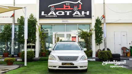  1 لكزس LS430 وارد 1/2 الترا موديل 2006 لون أبيض فتحة جلد رنجات خشب مرايا كهرباء بحالة ممتازة