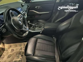  9 BMW 330e plug إن