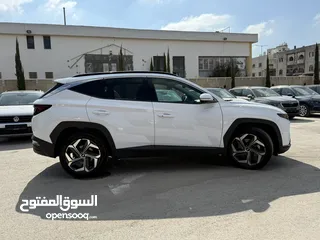  4 هونداي توسان ترخيص 2022 محرك 1600 هايبرد  جير أوتوماتيك 240 حصان