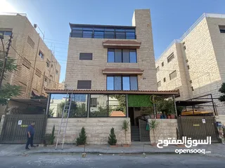  24 عماره ثلاث طوابق وروف بمواصفات خاصه للبيع في جبل الحسين