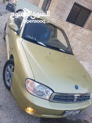  1 كيا سبكتر توماتيك اقساط دفعة 1200 دهان جديد  ماتور جديد  قير جيد  فحص مرفق  مكانيك سيارة مشية ناعمة
