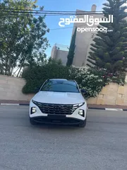 2 هونداي توسان ( هايبرد)  بنزين + كهرباء  فل الفل اضافات
