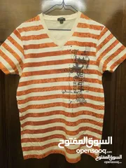  1 بوسيني تي شيرت للبيع