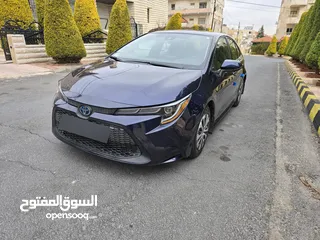  15 تويوتا كورولا 2021 ياباني بطارية ليثيوم قطعت مسافه 30 الف جمرك جديد بسعر مغري جدا