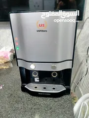  1 كولر ماء كوري us filters مع فلتر بحالة ممتازة