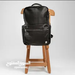  10 شنطة جلد من براند (WIWU) ضد المياه بكفالة الوكيل الحصري وتوصيل مجاني داخل عمان