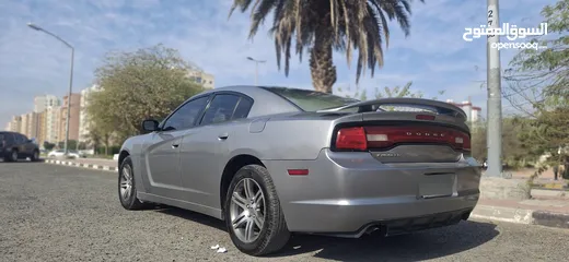  1 Urgent Sale Dodge Charger 2011 . v6. . Good Condition. . Neat and Clean. . .  Go vacation...