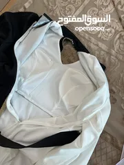  9 فستان ابيض و اسود ملبوس مره وحده بجنن عاللبس  بلبس لوزن 70 كيلو