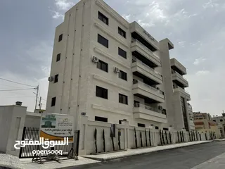  9 شقة طابق اخير مع رووف بمساحة داخلية 230م في طريق المطار - البنيات