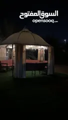  6 Danube home luxury gazebo with curtains and cushions.