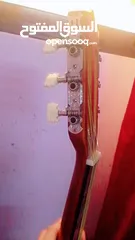  1 جيتار تعليمي مع ريشه