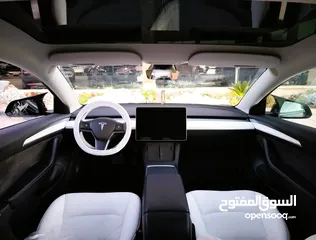  24 تيسلا 2023 model 3 فحص كامل اوتوسكور لون اسود ملوكي داخلي ابيض بحالة الوكالة للبيع بسعر لقطة ومحرووق