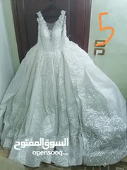  13 فساتين زفاف وخطبة... بدلات زفاف وخطبة وطرحات عروس وتوربان عروس