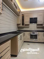  7 مطابخ مودرن خشب و الامنيوم  لماذا نحن.... نحن نريك مطبخك بتصميم واقعي جدا قبل أن ينفذ