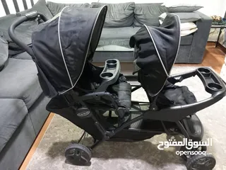  1 للبيع عرباية أطفال TWIN BABY STROLLER CENTRE POINT GRACO