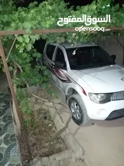  2 بك اب متسوبيشي   l200 موديل 2009 فور ويل 4X4