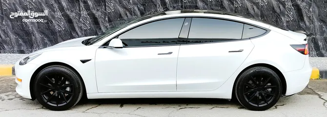  7 تيسلا 2022 model 3 بحالة الوكالة فحص كامل اوتوسكور +B لون مميز في الحرة للبيع بسعر لقطة ومحرووووق