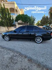  12 BMW E39 الدب