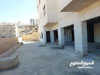  14 شقة طابقيه ارضيه مع تسويه للبيع في ابو نصير
