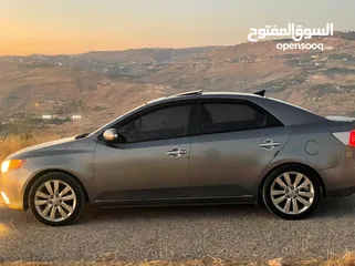  1 KIA forty  2010 Full options