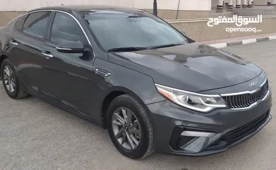  2 KIA Optima FX