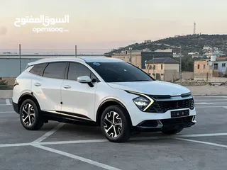  9 كايا سبورتاج /2022 فل بدون فتحة سقف  2x4 ///240Hp بنزين + كهرباء  ( Haybrid) 1600cc